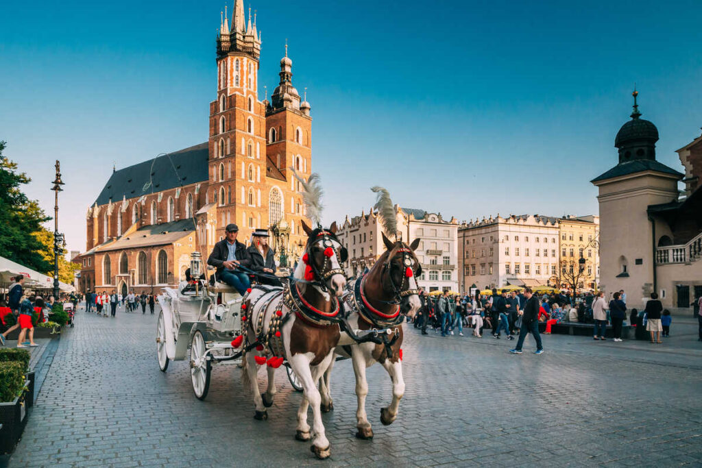 Horse carriage ride in Krakow Main Square